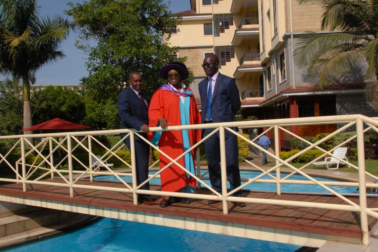 Dr. Carole Ouko (2019 Ph.D Graduate in Environmental Policy) poses for a photo with Dr. Collins Odote and Prof. Richard Mulwa. 