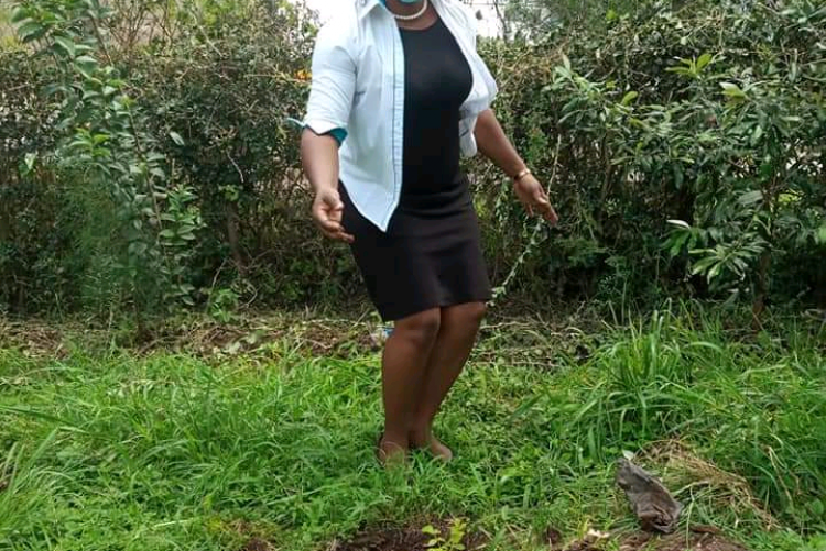 Susan Darya, CASELAP Registrar, during the tree planting session.